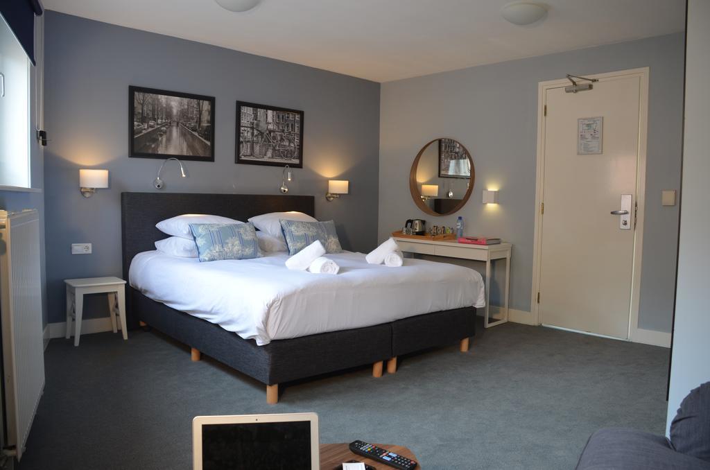 Frisco Inn Амстердам Стая снимка
