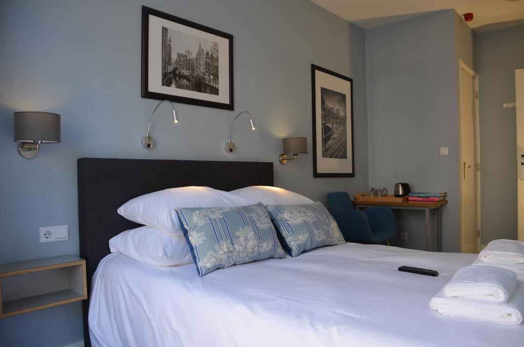 Frisco Inn Амстердам Стая снимка